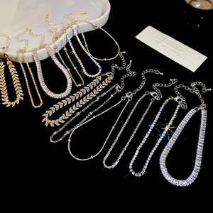 Sparkling zircon bracelet set with herringbone, bead, and tennis chain styles in gold and silver