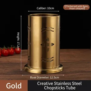 Detail of golden stainless steel cutlery holder with heart cutouts and size dimensions