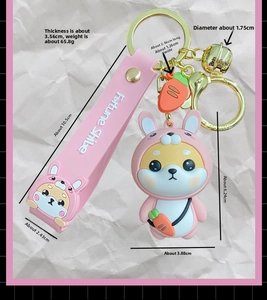 Detailed dimensions showing height and width of a cute pink Shiba Inu dog keychain