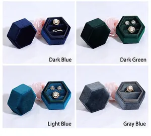 Hexagonal velvet jewelry boxes in four colors with pearl rings and earring sets