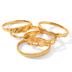 Set of five 18k gold plated stainless steel bangles with diverse textured designs