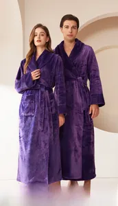 Detail of purple thick flannel bathrobe showing plush texture and textured collar detail