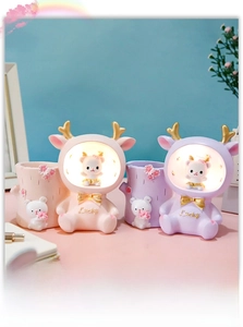 Macro view of cartoon rabbit night light with lucky text and built-in pen holder