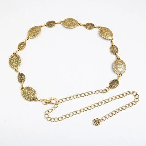 Detailed view of adjustable golden metal waist chain with textured oval links and lobster clasp