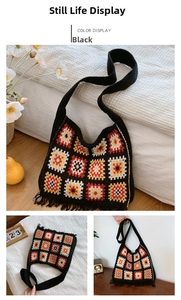 Detail of a vintage black crochet tote bag with colorful geometric squares and fringe