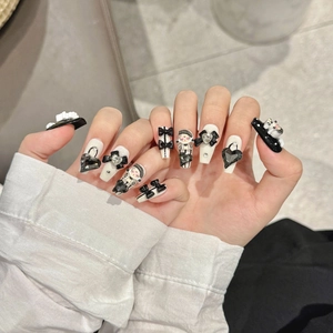 Handmade dark punk press-on nails with 3D bows, black diamonds and checkers