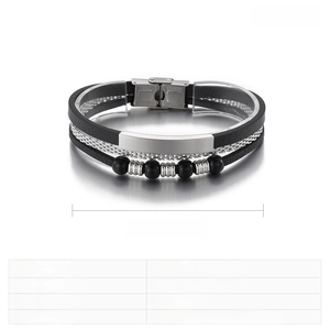 Detailed view of multilayer braided leather cord with polished stainless steel plate charm