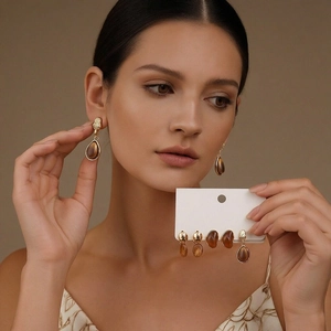 Vintage resin earring set featuring amber drop and oval studs in a 6-piece brown collection