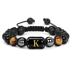 Detail of hand-woven 10mm lava stone bracelet with golden letter K bead and tiger eye beads