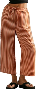 Detail of colorful striped wide-leg pants with cargo pockets and drawstring waist