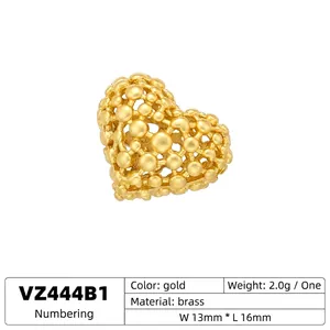 Hollow heart-shaped brass bead with gold-tone beaded texture for DIY jewelry making