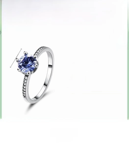 Detail view of 925 silver ring with 0.7cm blue tanzanite zircon and polished finish