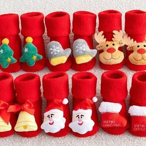Thick red Christmas baby socks with 3D cartoon ornaments like Santa and reindeer