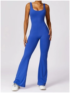 Detail of royal blue slimming yoga bodysuit with flare leg design and high waist fit