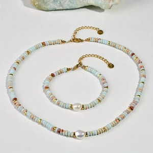 Bohemian jewelry set featuring light blue stone beads and baroque pearl necklace and bracelet