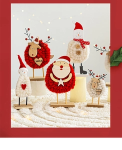 Christmas wooden and wool felt ornaments featuring Santa, snowman, and reindeer