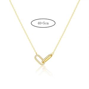 Detail of interlocking gold double oval pendant with micro-inlaid diamonds and 40+5cm chain