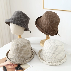 Plaid wide brim sun hat with ribbon bow available in brown and beige colors