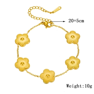 Gold floral link bracelet in stainless steel with five charms and adjustable chain