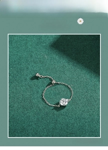 Detail view of S925 sterling silver chain ring with round zircon and adjustable slider