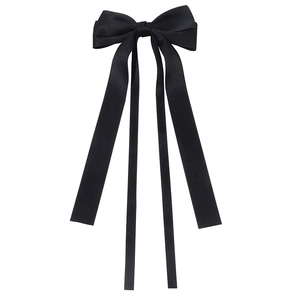 Elegant black satin bow hair clip with long ribbons for a minimalist and sweet hairstyle