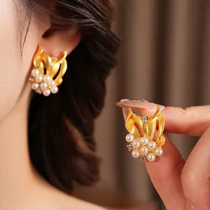 Vintage style gold floral earrings with pearls and zircon crystals for an elegant look