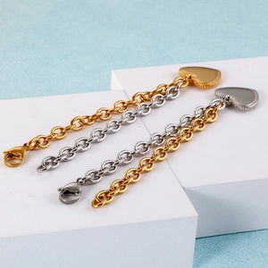 Two-tone gold and silver stainless steel heart pendant bracelet with chunky link chain
