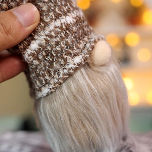 Christmas faceless gnome doll featuring a brown knit hat and long white plush beard