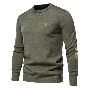 Detail of army green crewneck sweater showing vintage elbow patches and fine knit texture