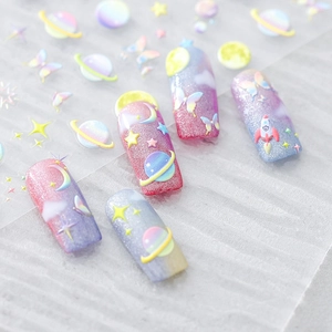 3D embossed nail stickers featuring purple celestial planets, butterflies and stars