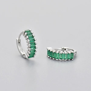Silver hoop earrings featuring rectangular green zircon stones in a sleek channel setting