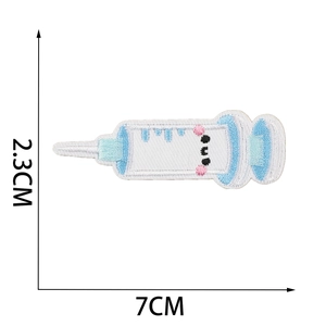 Detailed view of cute syringe embroidery patch with pink blush, size 7cm x 2.3cm