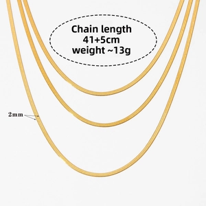 Detail of 2mm gold flat snake chain necklace with 41+5cm length and 13g weight