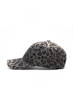 Close-up of side view of vintage leopard print baseball cap with distressed edge details
