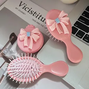 Pink bow hairbrush set with massage air cushions and portable mirror hair combs