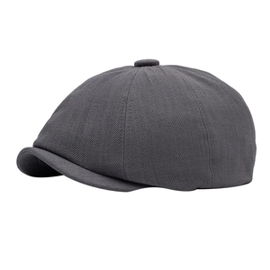 Classic dark grey octagonal newsboy cap with textured twill fabric and button top
