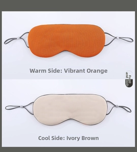 Detailed close-up showing the double-sided warm and cool silk fabric of the sleep eye mask
