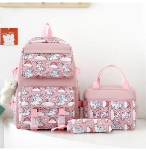 Pink three-piece school bag set including backpack, handbag and pencil case with unicorn