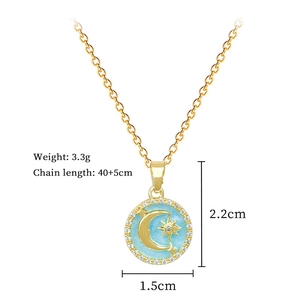Detail of star and moon pendant with light blue enamel, includes size and weight specs