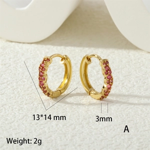 Macro shot showing 13x14mm gold-plated hoop earrings with red micro-paved zircons