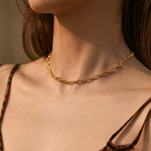 Modern 18K gold plated brass link chain necklace shown on neck for a minimalist look