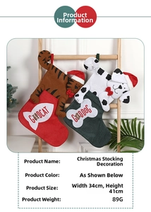 Detailed view of GoodCat and GoodDog Christmas stockings with sequins and bows