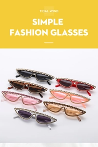 Detail shot of cat eye sunglasses with rhinestone embellishments in seven vibrant colors