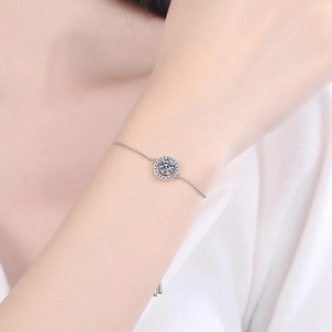 Moissanite 1 carat s925 silver bracelet featuring star-moon design on a female wrist