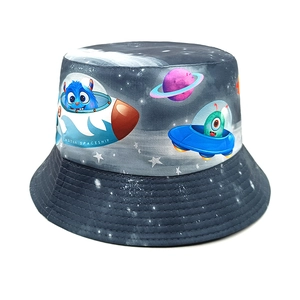 Detail of cartoon spaceship and alien prints on dark grey children's bucket hat fabric