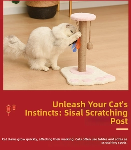 Pink and white sisal cat scratching post with hanging toys and plush base for kittens
