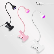 Tre lampade UV LED con clip USB in nero, rosa e bianco con braccio flessibile