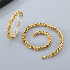 Set di collana e bracciale in acciaio inossidabile dorato con maglia intrecciata lucida