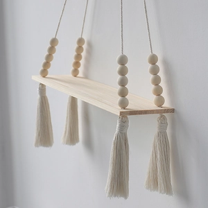 Bohemian woven macrame wall hanging shelf with wooden beads and decorative tassels