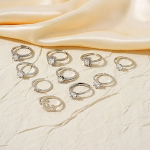 Detailed arrangement of 10-piece silver adjustable rings set with cubic zirconia accents